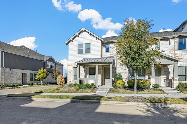 view of front of home featuring covered porch