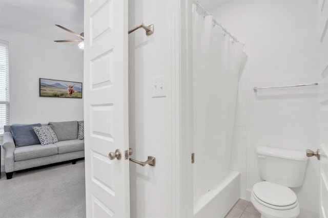 bathroom with toilet, tile patterned flooring, and shower / bath combo