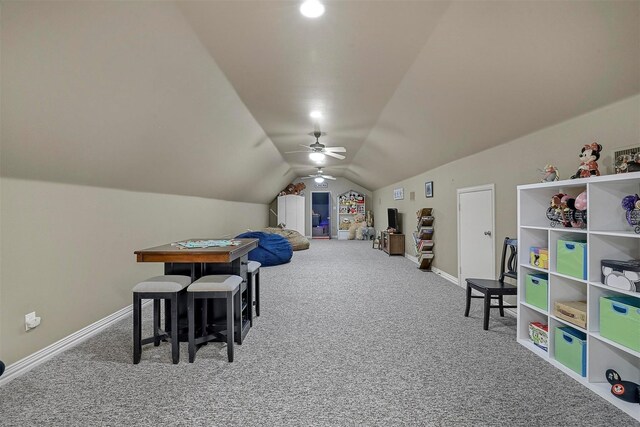 game room with carpet flooring, ceiling fan, and lofted ceiling