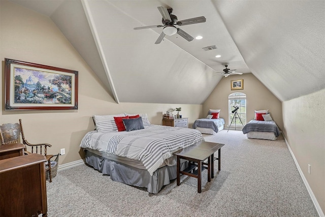 bedroom featuring ceiling fan, light colored carpet, and lofted ceiling