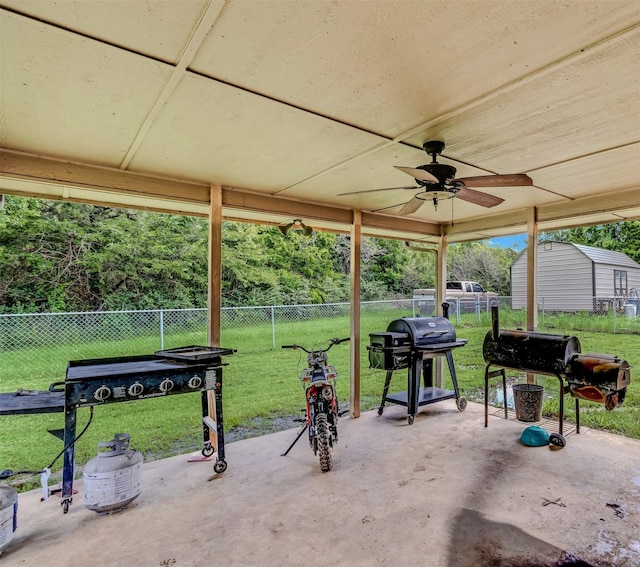 view of patio featuring a grill and ceiling fan