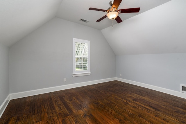 bonus room with dark hardwood / wood-style flooring, vaulted ceiling, and ceiling fan