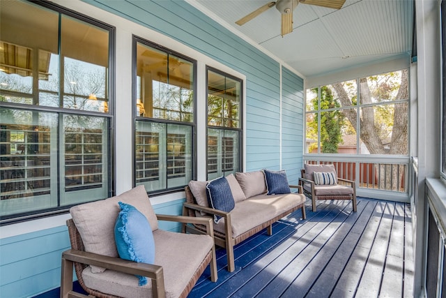 sunroom with ceiling fan and a healthy amount of sunlight