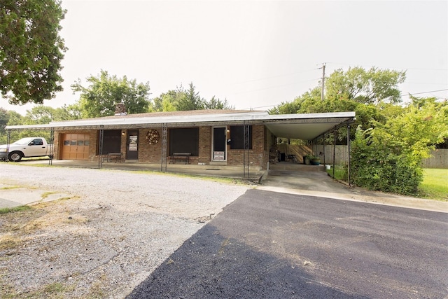 view of front of house featuring a carport