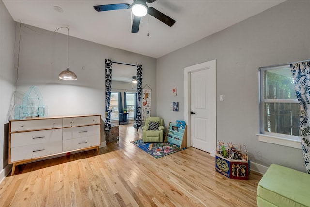 sitting room with light hardwood / wood-style floors