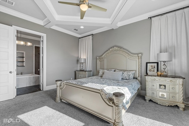 bedroom featuring carpet, ensuite bath, ceiling fan, and crown molding