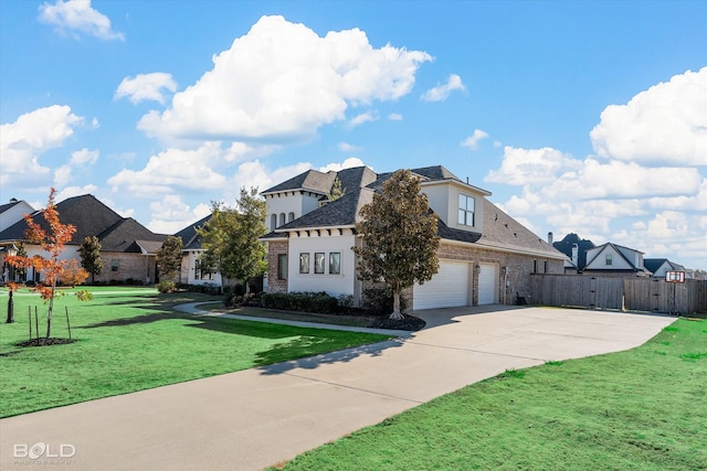 view of front facade with a front yard and a garage