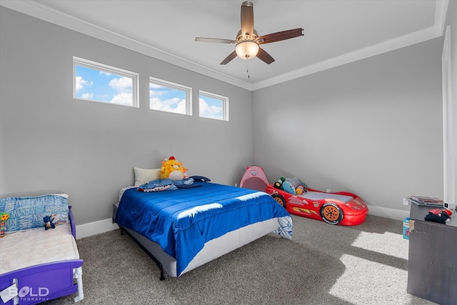 carpeted bedroom featuring crown molding and ceiling fan