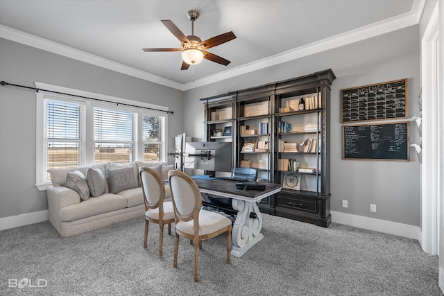 carpeted office with ornamental molding and ceiling fan