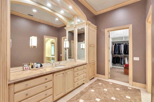 bathroom with vanity, tile patterned floors, and crown molding