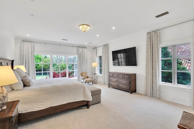 carpeted bedroom featuring ornamental molding