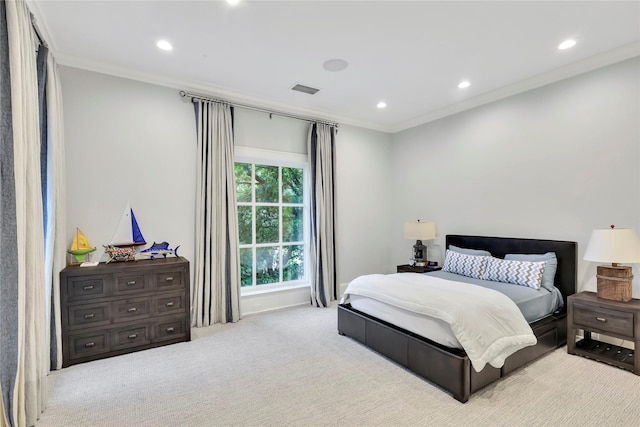 bedroom featuring crown molding and light carpet