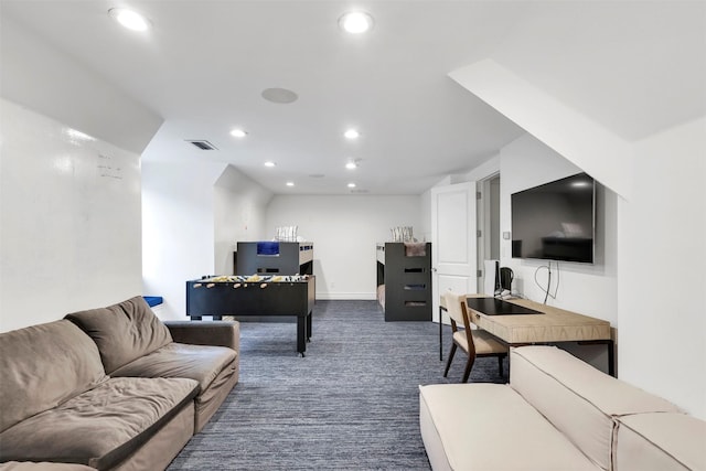 living room featuring dark colored carpet