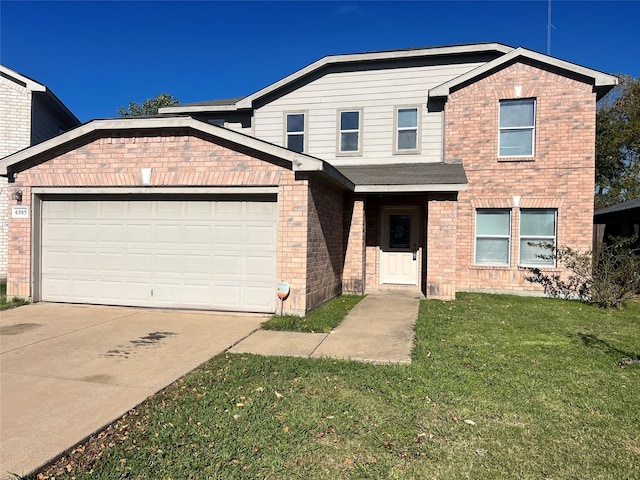 view of front of property featuring a garage and a front lawn