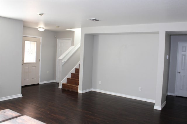 interior space with dark hardwood / wood-style flooring