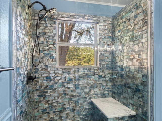 bathroom with tiled shower