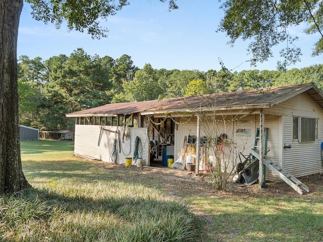 exterior space with a front yard