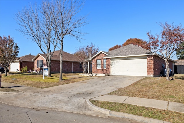 single story home with a garage and a front lawn