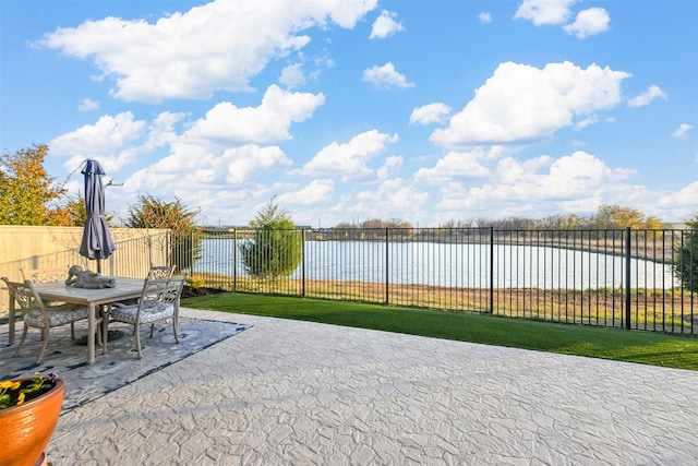 view of patio / terrace featuring a water view