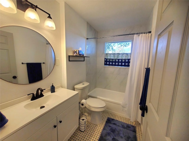 full bathroom with vanity, toilet, and shower / tub combo