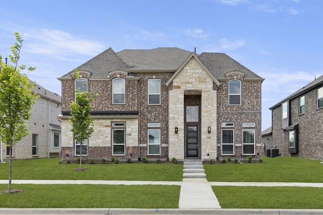 1347 Overton St, Frisco, TX 75036 - french provincial home with a front yard, central air condition unit, a shingled roof, and stone siding