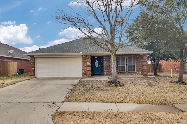 single story home featuring a garage