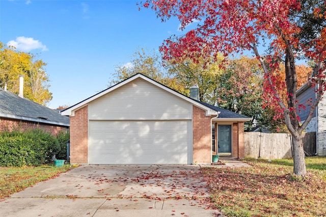 single story home featuring a garage