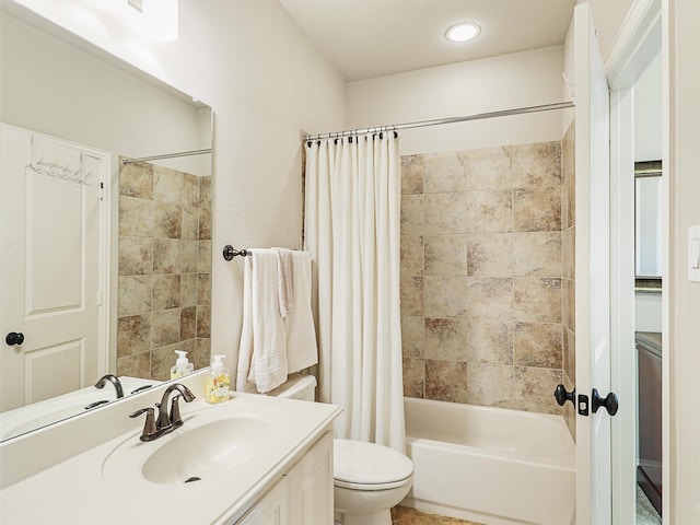 full bathroom featuring vanity, shower / bathtub combination with curtain, and toilet