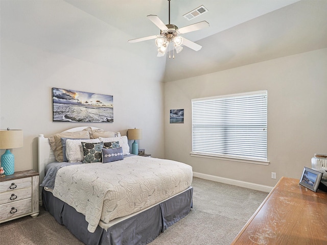 carpeted bedroom with ceiling fan and lofted ceiling