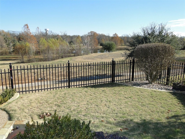 view of yard with a rural view