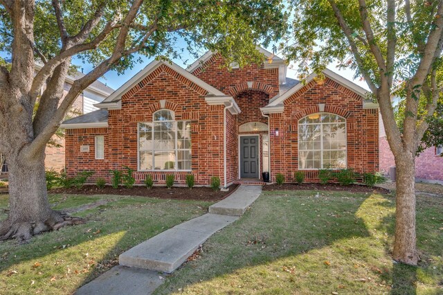 view of front property with a front yard