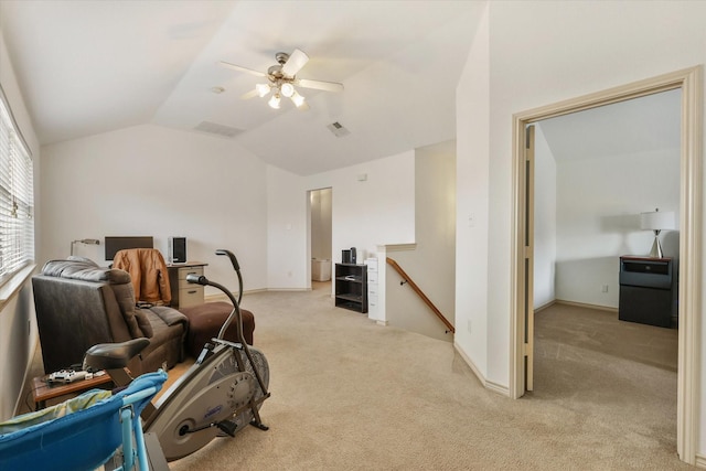 interior space with light colored carpet, ceiling fan, and lofted ceiling