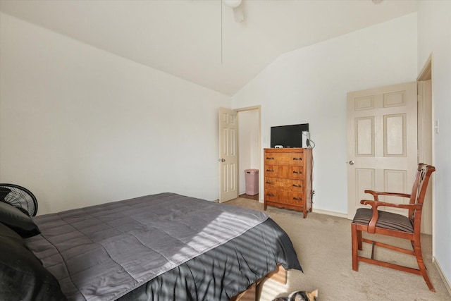 carpeted bedroom featuring ceiling fan and high vaulted ceiling