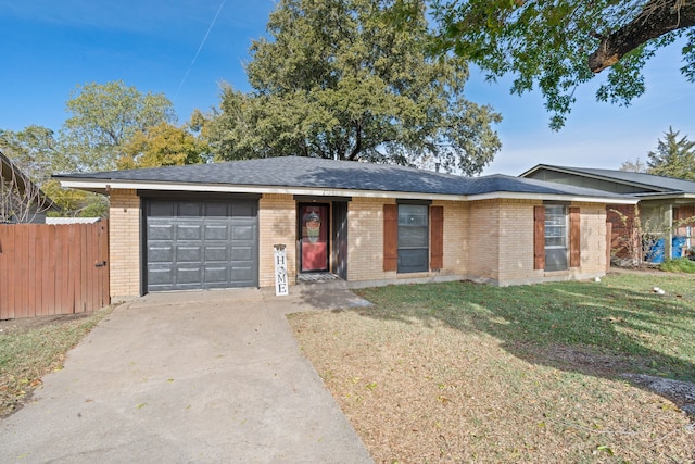 ranch-style house with a front lawn and a garage