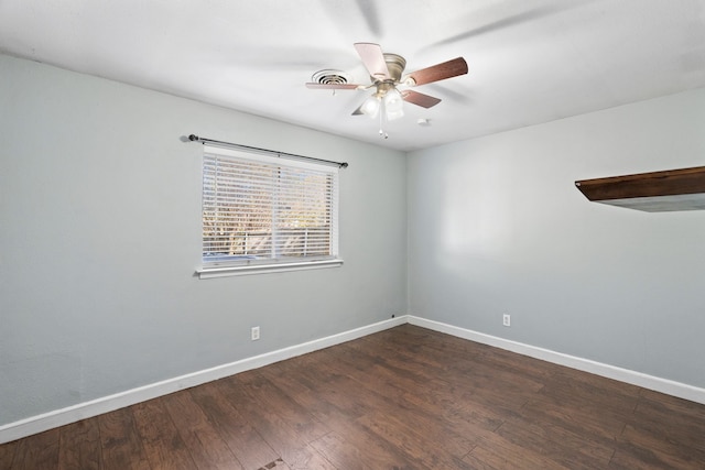 empty room featuring dark hardwood / wood-style floors