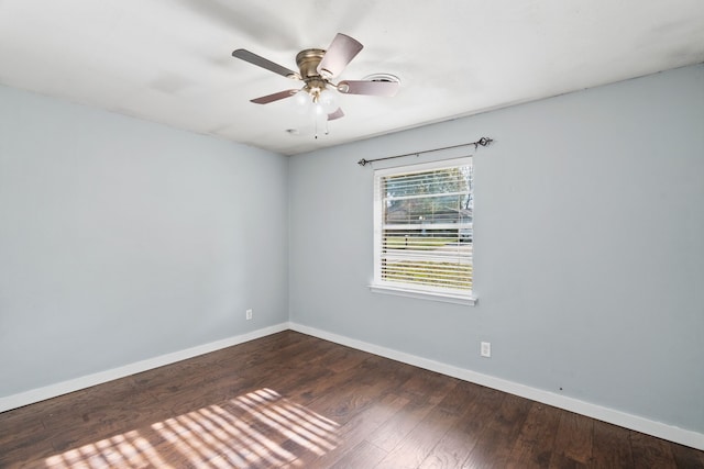 empty room with hardwood / wood-style flooring and ceiling fan