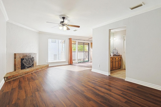 unfurnished living room featuring ceiling fan, a fireplace, ornamental molding, and hardwood / wood-style flooring