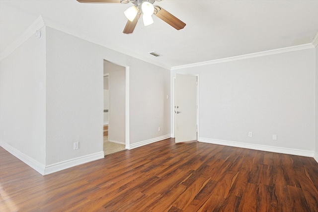 unfurnished room featuring dark hardwood / wood-style floors, ceiling fan, and ornamental molding