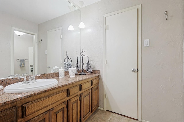 bathroom featuring vanity and tile patterned floors