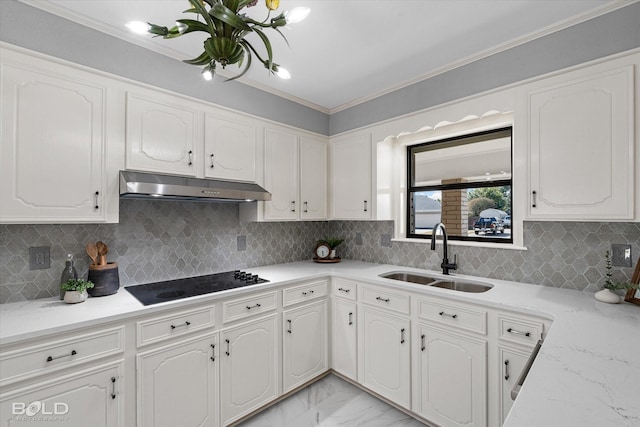 kitchen with black electric cooktop, white cabinetry, crown molding, and sink