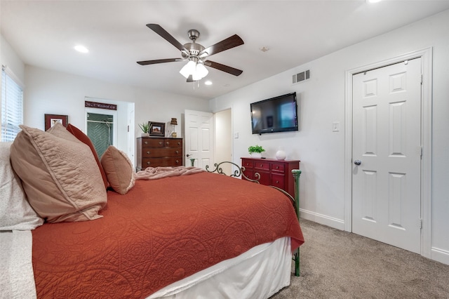 carpeted bedroom featuring ceiling fan