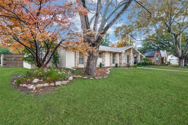 view of front of home with a front yard