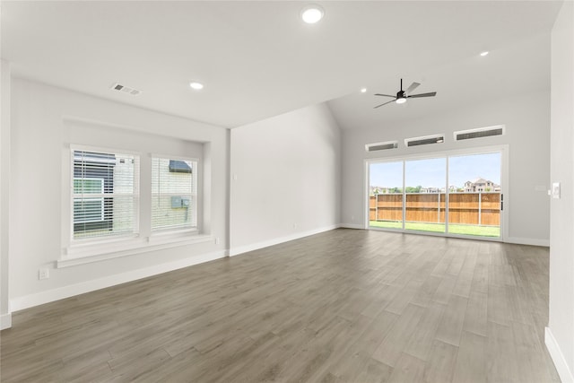 1514 Overton St, Frisco, TX 75036 - unfurnished room with baseboards, ceiling fan, lofted ceiling, and recessed lighting