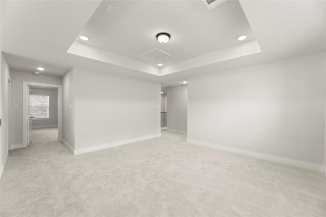 1514 Overton St, Frisco, TX 75036 - unfurnished room with recessed lighting, a raised ceiling, baseboards, and light colored carpet