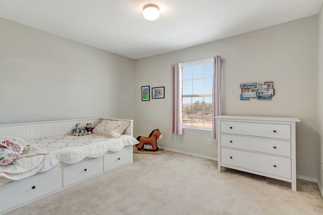 bedroom with light carpet