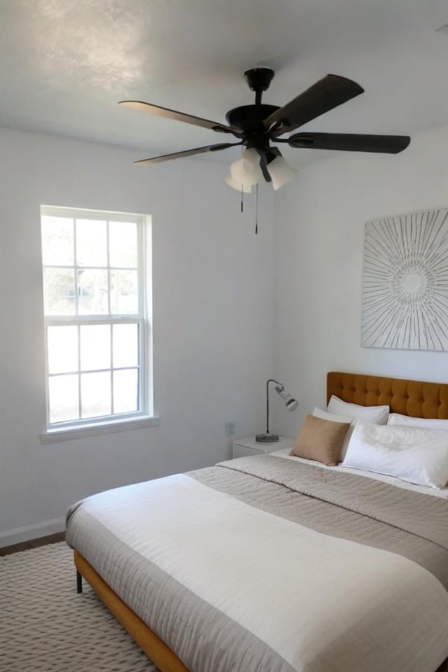 bedroom featuring ceiling fan