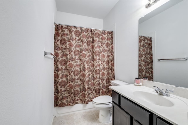 full bathroom featuring tile patterned floors, shower / bathtub combination with curtain, vanity, and toilet