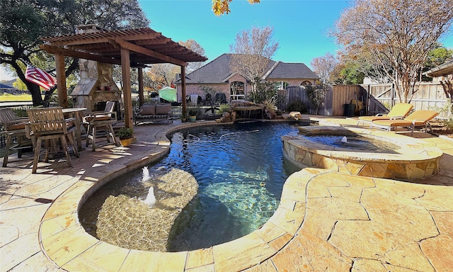 view of pool with an in ground hot tub, an outdoor stone fireplace, a pergola, and a patio area