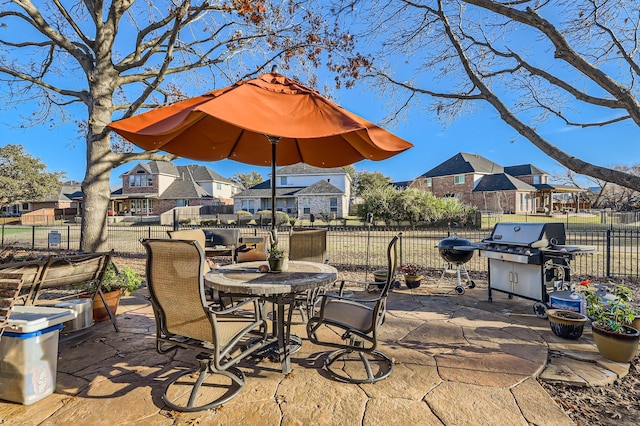 view of patio with a grill