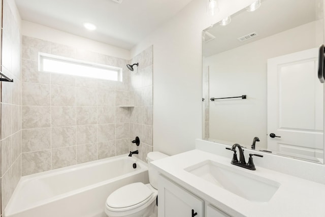 full bathroom with toilet, visible vents, tub / shower combination, and vanity